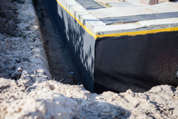 Professional Waterproofing technician working in Stapleton, AL